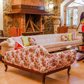 Cozy living area offering personalized service at premium bungalows in Lonavala with a warm and homely ambiance